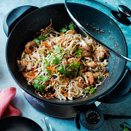 A classic pad Thai with shrimp and tofu prepared in a Breville Hot Wok.