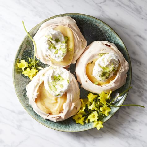 Mini Pavlovas with Lemon Curd, Whipped Cream and Shaved Pistachio-image