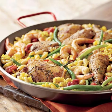 Paella a la Valenciana Paella a la Valenciana