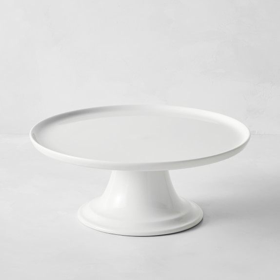 white cake stand with glass dome