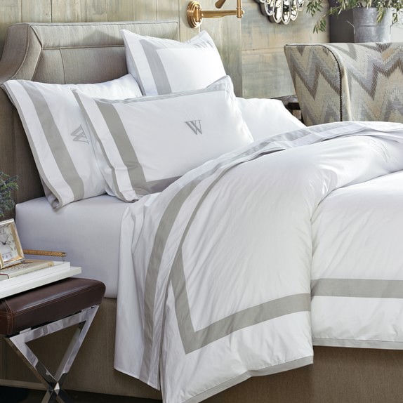 white bedding with grey border