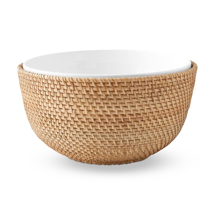 Glass salad bowl with woven rattan holder