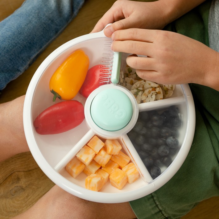 Bumwear - The GoBe Snack Spinner makes snacking on-the-go a breeze with  five snacking compartments, all in one container! It's the only snack  dispenser with an interactive button to keep kids engaged