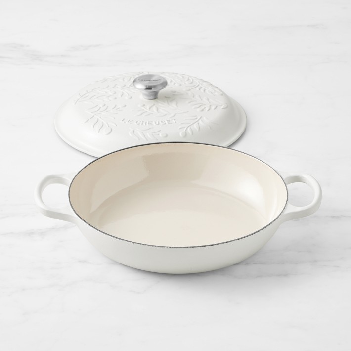 https://assets.wsimgs.com/wsimgs/ab/images/dp/wcm/202331/0010/le-creuset-enameled-cast-iron-olive-branch-braiser-3-1-2-q-o.jpg