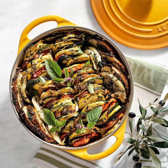 https://assets.wsimgs.com/wsimgs/ab/images/dp/wcm/202332/0077/le-creuset-enameled-cast-iron-shallow-round-oven-2-3-4-qt-o.jpg