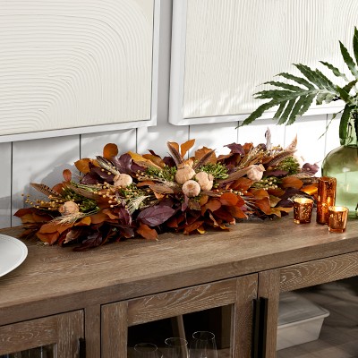 Fall-Inspired Centerpiece with Pheasant Feathers