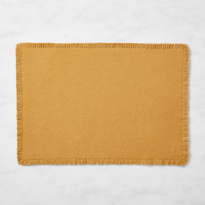 https://assets.wsimgs.com/wsimgs/ab/images/dp/wcm/202334/0355/fringed-placemats-o.jpg