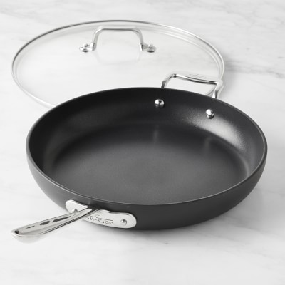 https://assets.wsimgs.com/wsimgs/ab/images/dp/wcm/202340/0002/all-clad-ha1-hard-anodized-nonstick-fry-pan-with-lid-12-m.jpg