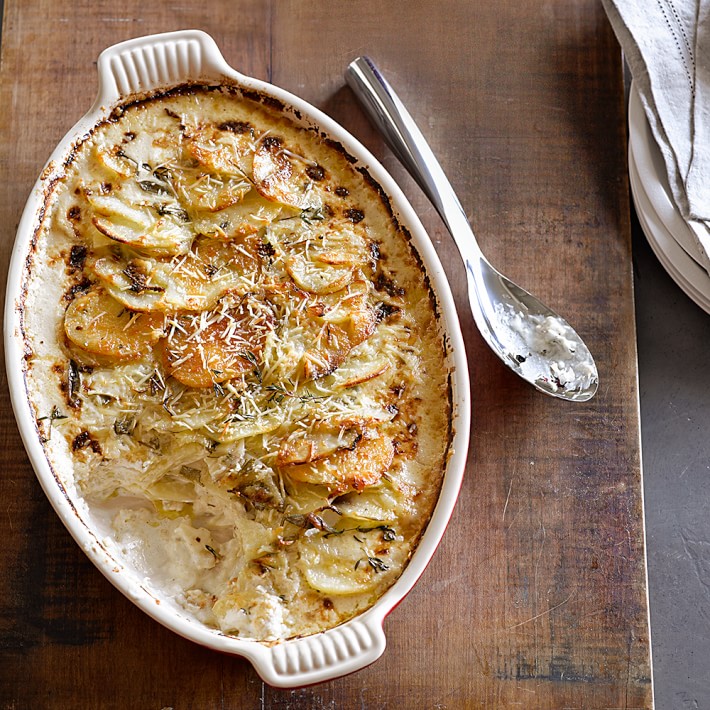 https://assets.wsimgs.com/wsimgs/ab/images/dp/wcm/202340/0063/le-creuset-heritage-stoneware-oval-gratin-o.jpg