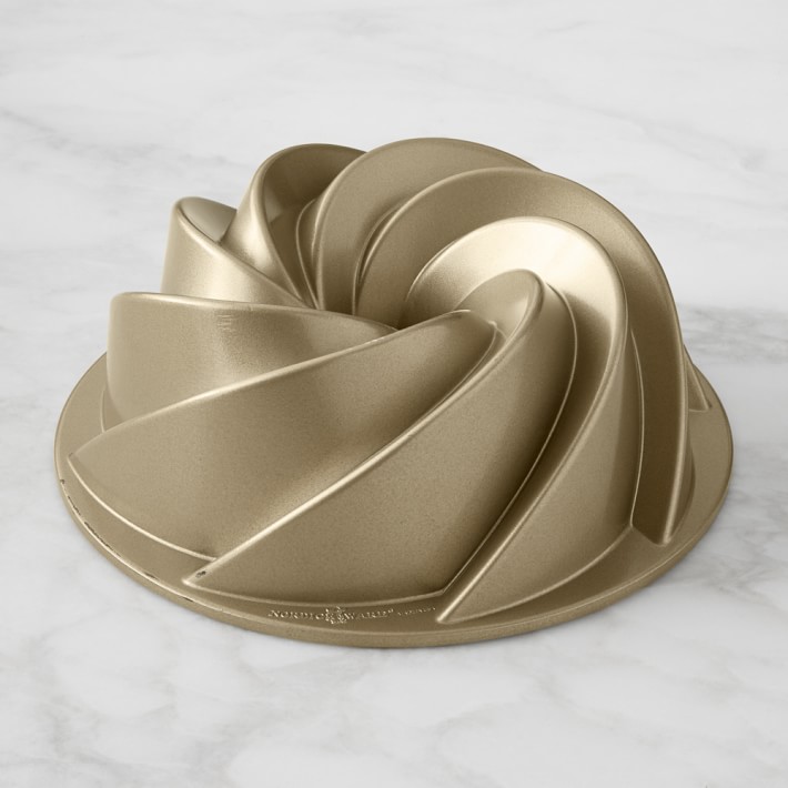 https://assets.wsimgs.com/wsimgs/ab/images/dp/wcm/202340/0070/nordic-ware-nonstick-cast-aluminum-small-heritage-bundt-ca-o.jpg