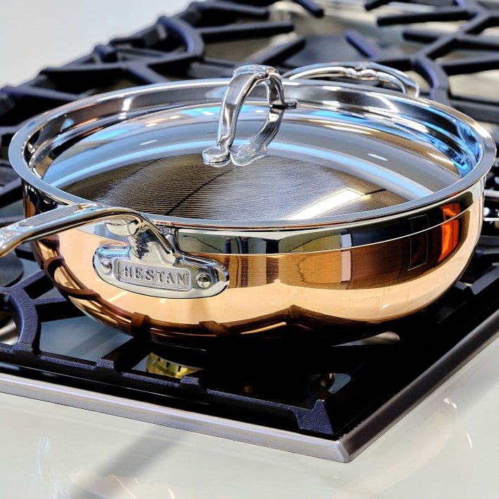 https://assets.wsimgs.com/wsimgs/ab/images/dp/wcm/202340/0081/hestan-copperbond-covered-essential-pan-with-handle-helper-o.jpg
