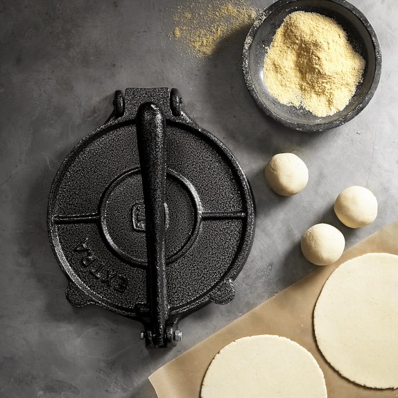 https://assets.wsimgs.com/wsimgs/ab/images/dp/wcm/202340/0101/cast-iron-tortilla-press-c.jpg