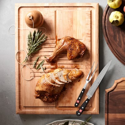https://assets.wsimgs.com/wsimgs/ab/images/dp/wcm/202340/0145/williams-sonoma-essential-cutting-carving-board-maple-m.jpg