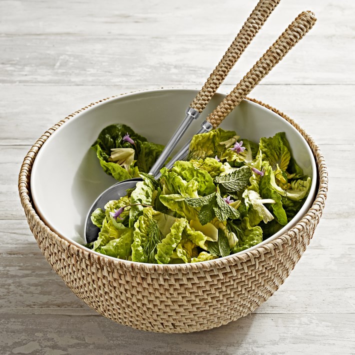 Glass salad bowl with woven rattan holder