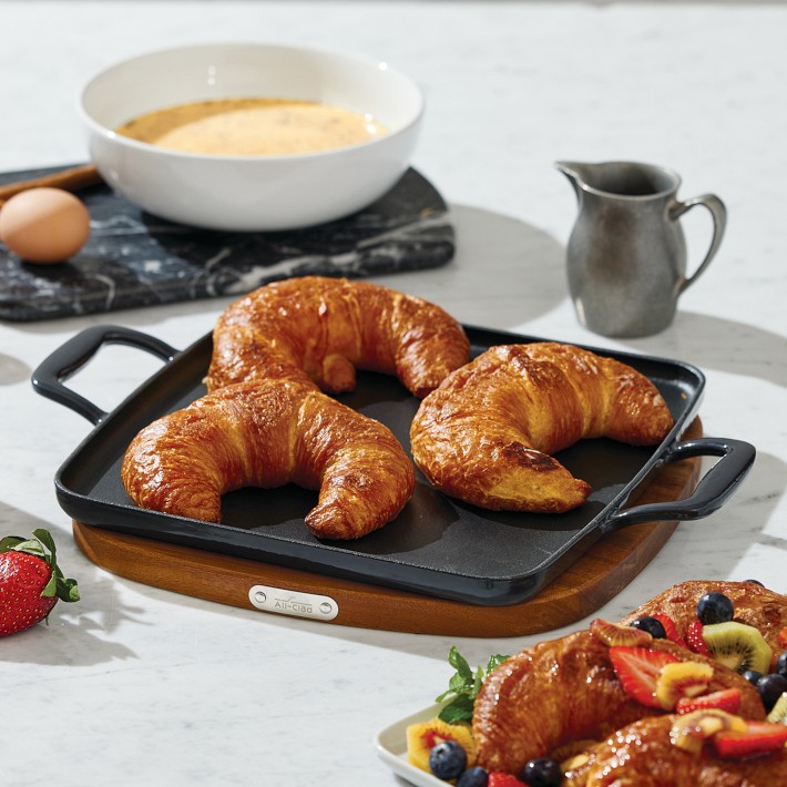 https://assets.wsimgs.com/wsimgs/ab/images/dp/wcm/202351/0011/all-clad-enameled-cast-iron-griddle-with-trivet-11-o.jpg