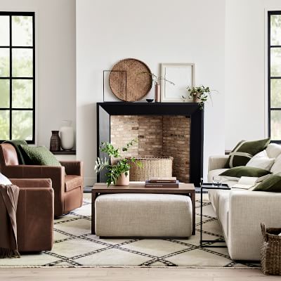 Cocktail table with store ottomans underneath