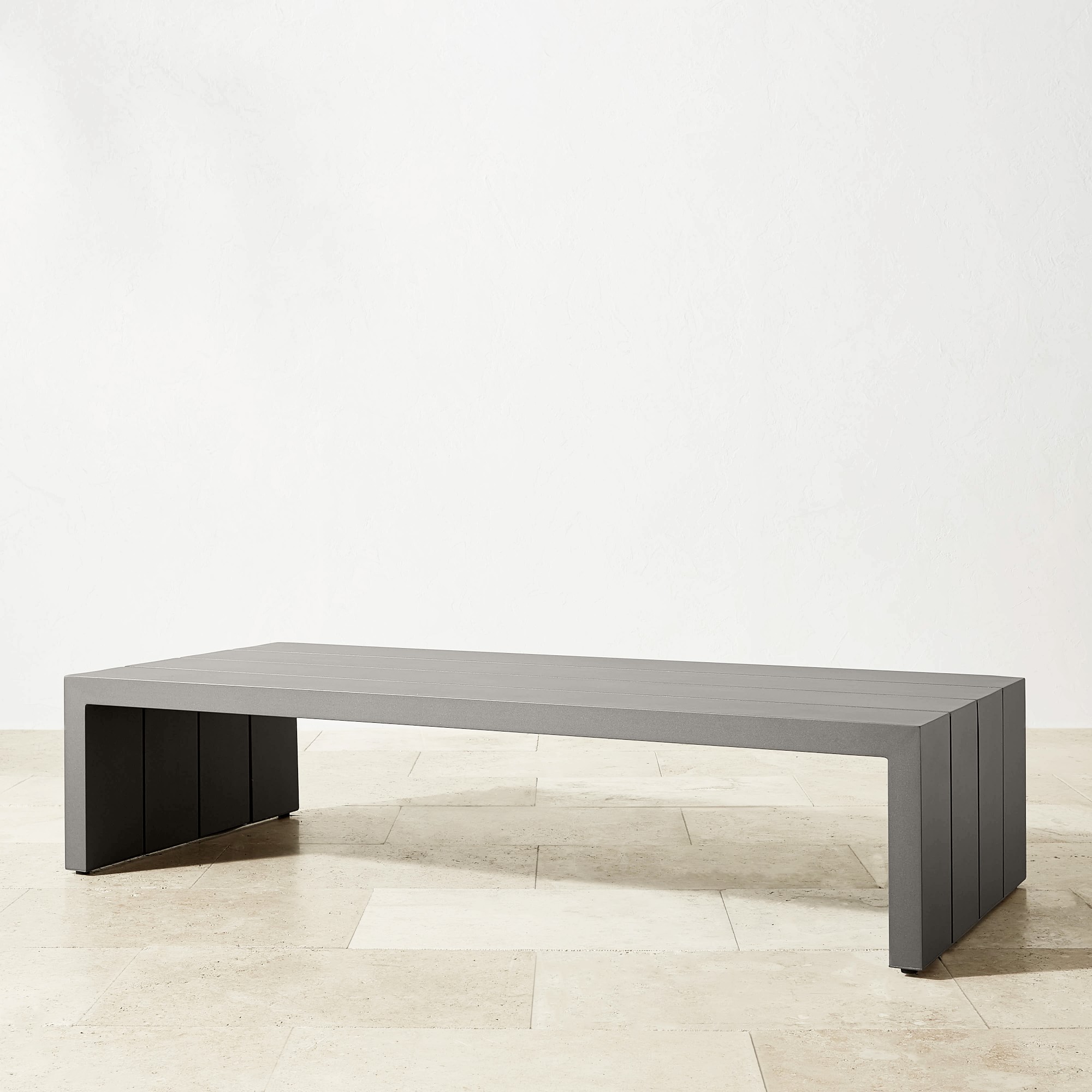 Close-up of a gray slatted bench base