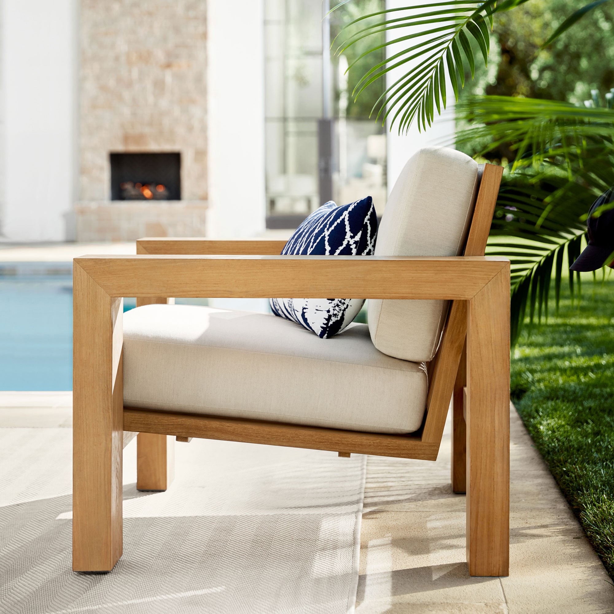 Patio area with sofa set and ocean view in distance