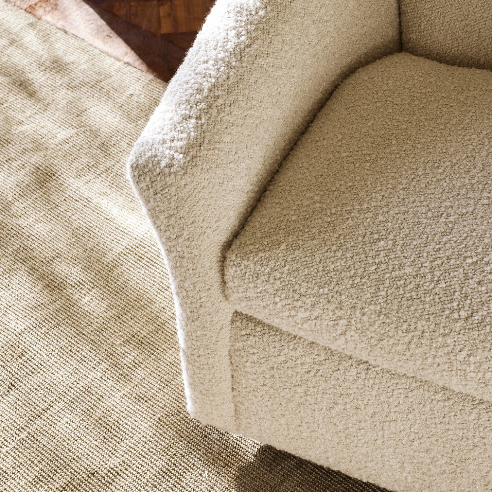 Beige boucle armchair texture and seam detail