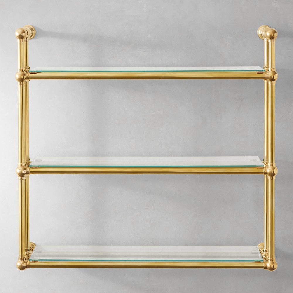 Brass-framed glass shelf with three tiers