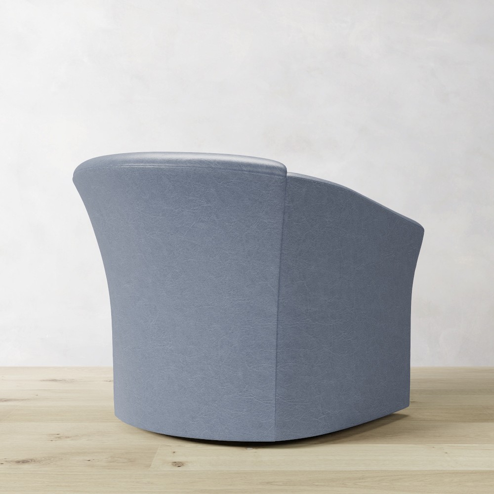 Blue bouclé armchair rear view