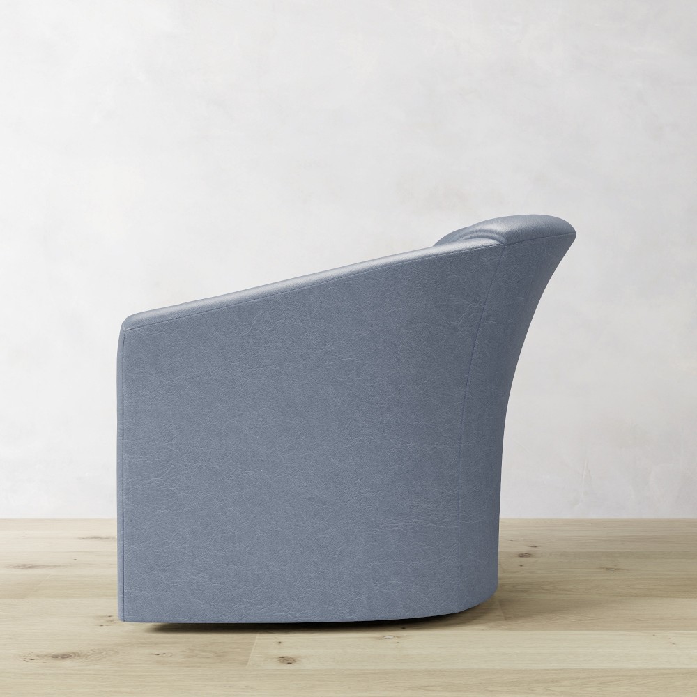 Blue rounded armchair side view