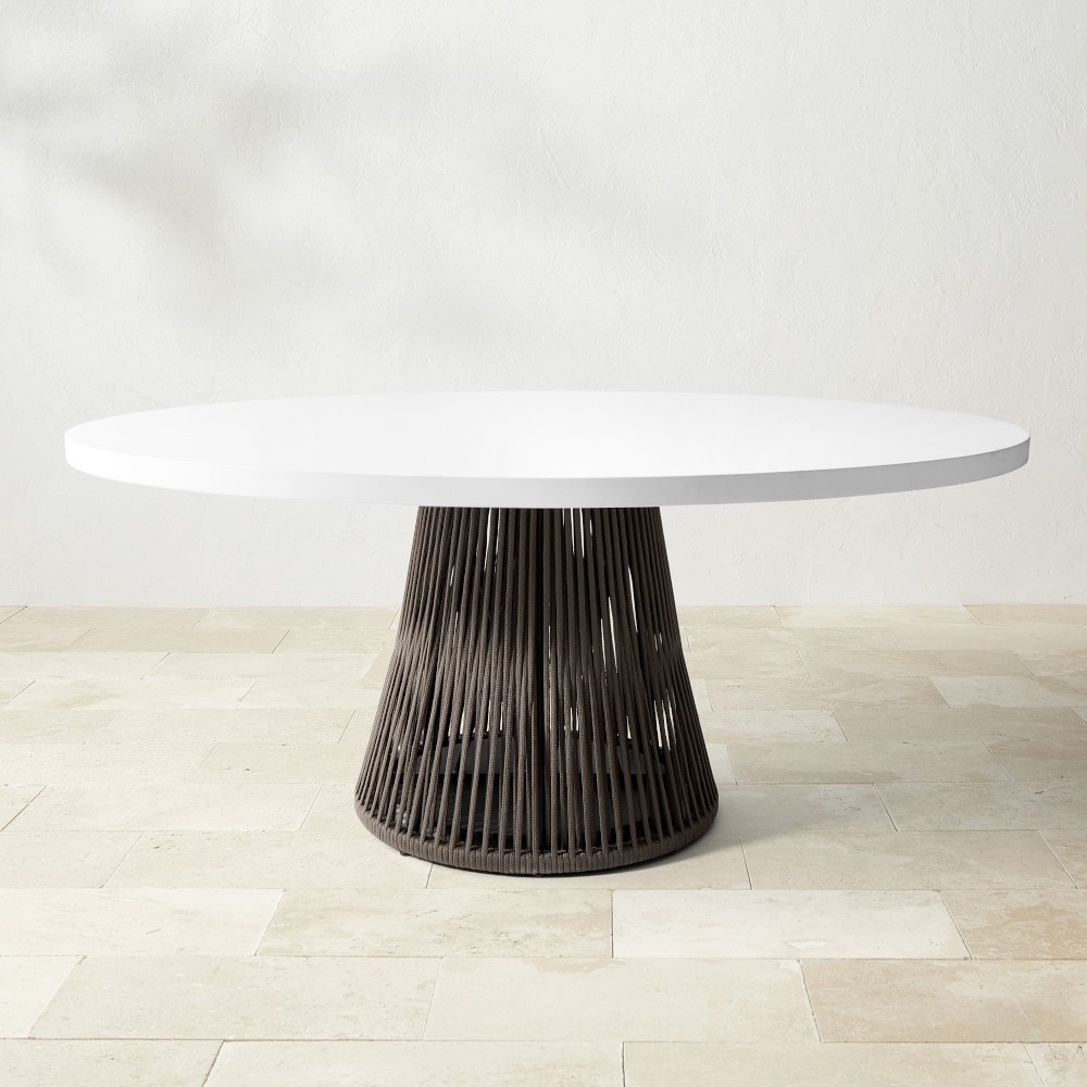 Table with white top and dark slatted pedestal