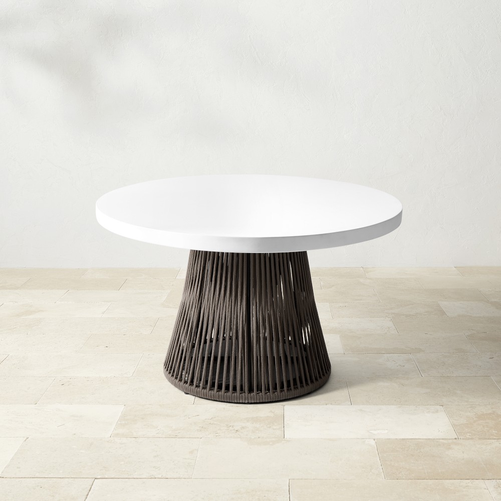 Table with white top and dark slatted pedestal (slightly left)