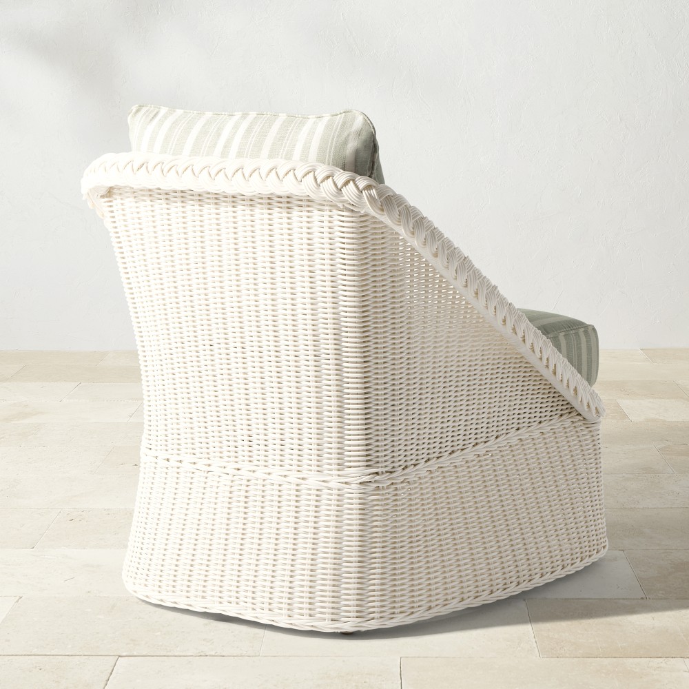 Rear/side angled view of white wicker chair