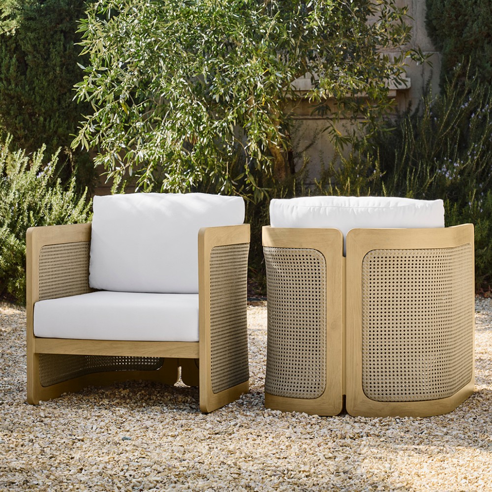 Two modular outdoor ottomans with white cushions
