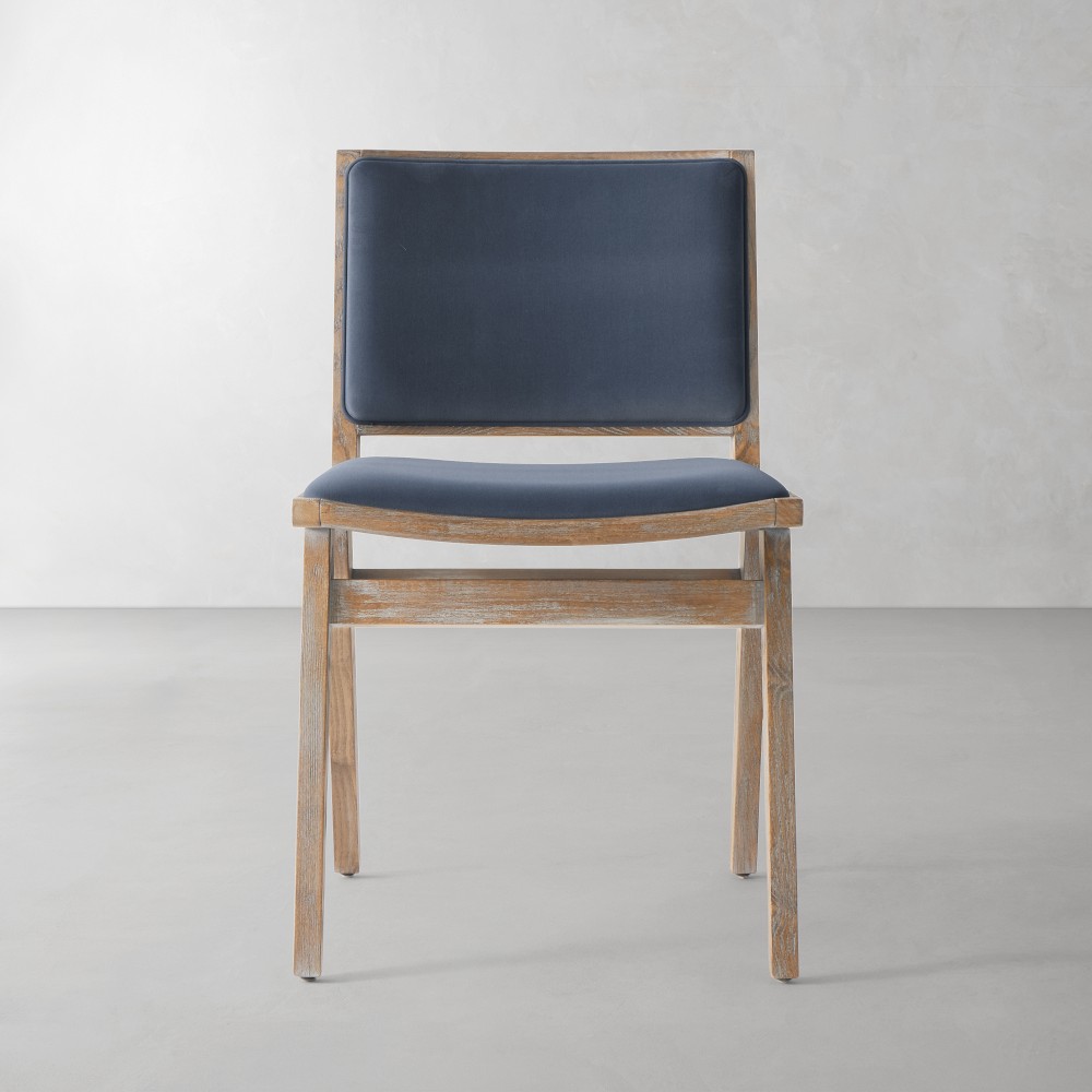 Solara upholstered dining chair standalone against light background