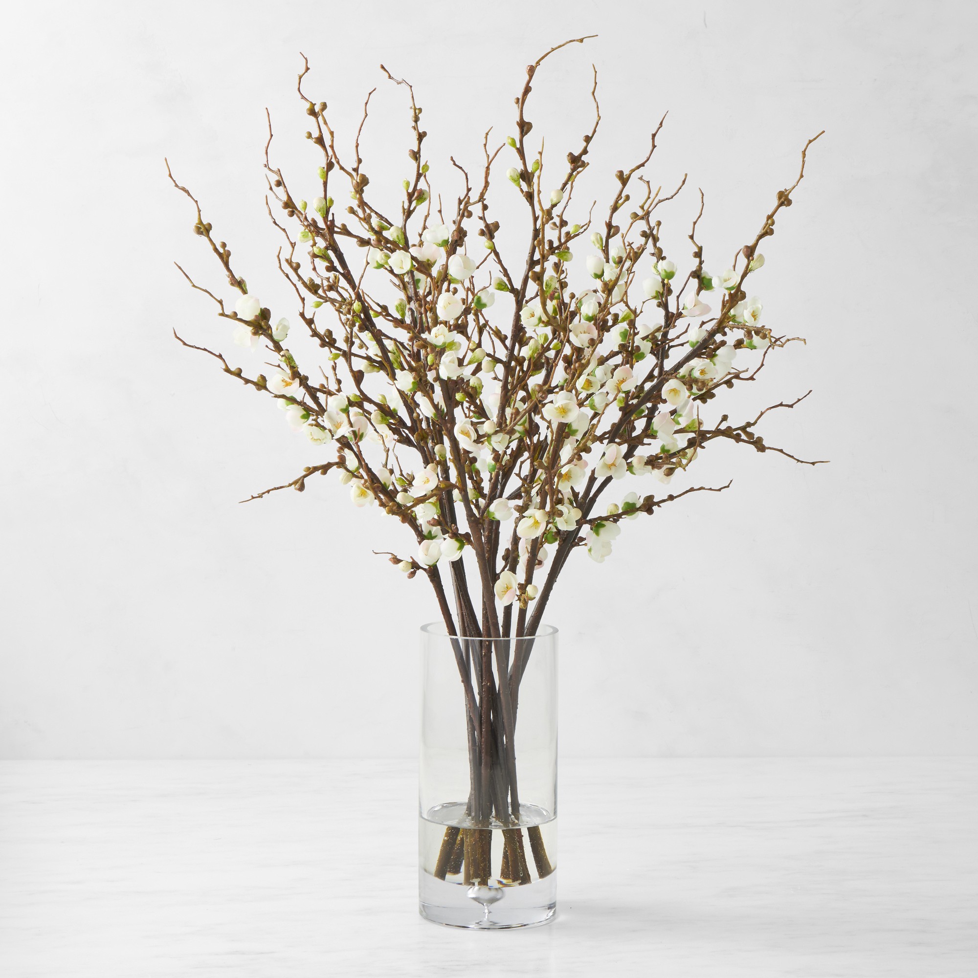 Faux Peach Blossom Arrangement in Glass Vase Simolary simolary.com