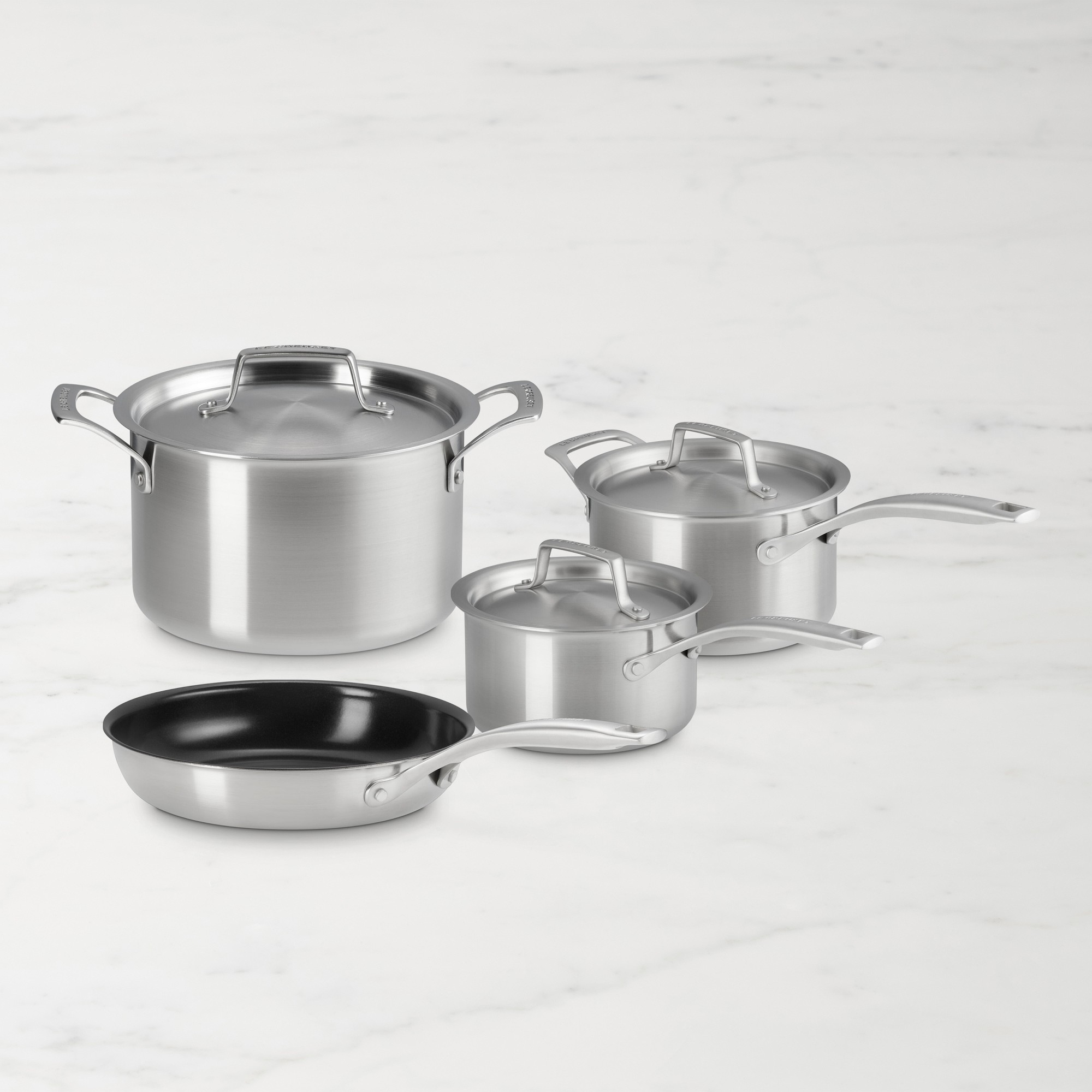 Le Creuset Essential Stainless-Steel Mixed Material 7-Piece Cookware Set Simolary simolary.com
