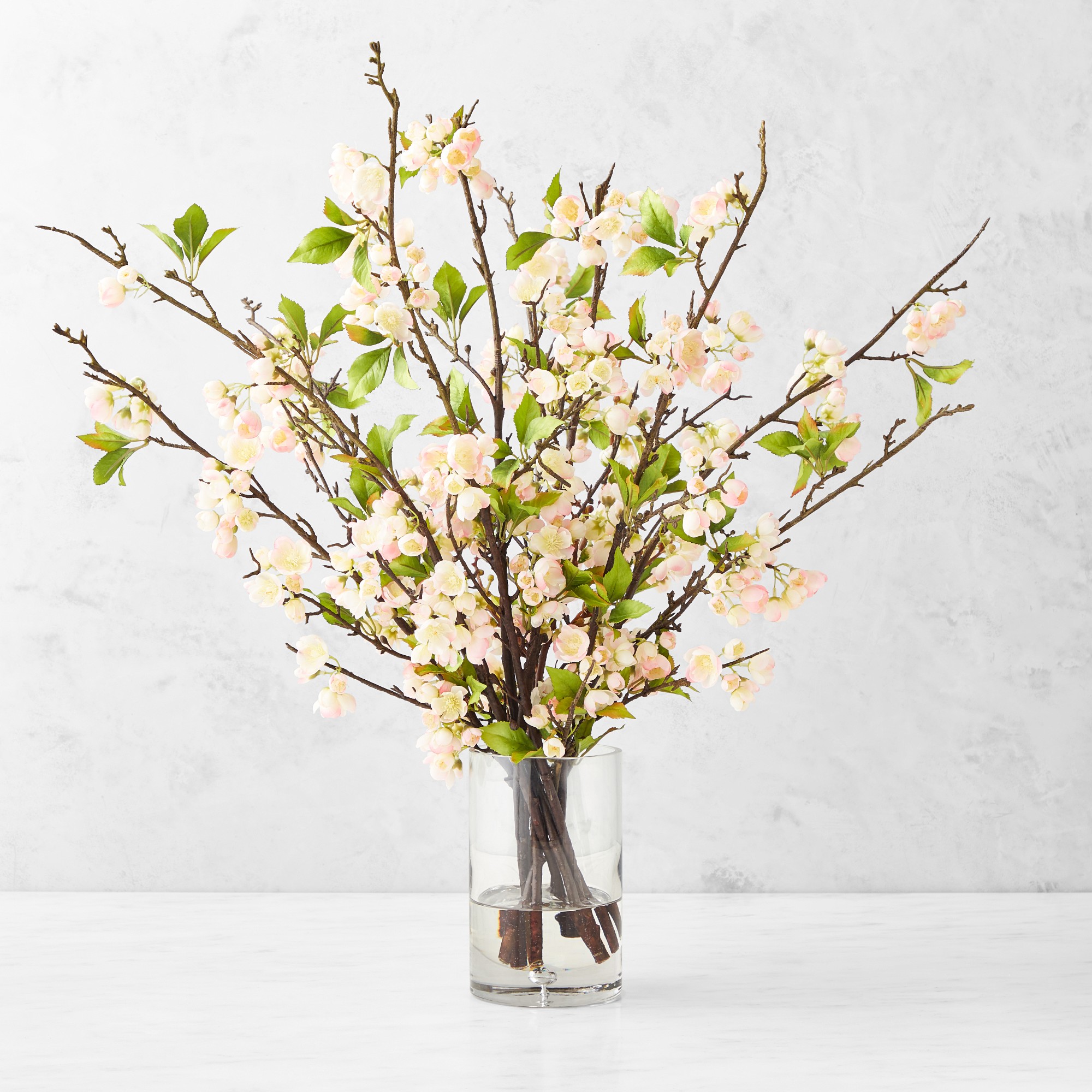 Faux Plum Blossom Arrangement in Glass Vase Simolary simolary.com