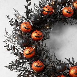 Jack O'Lantern &amp; Black Pumpkin Pre-Lit Faux Wreath, 28"