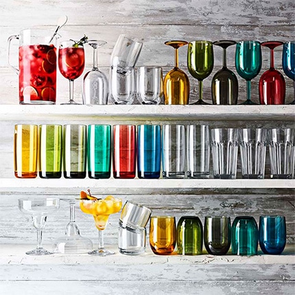 Several shelves displaying a range of DuraClear casual drinkware pieces in various colors.