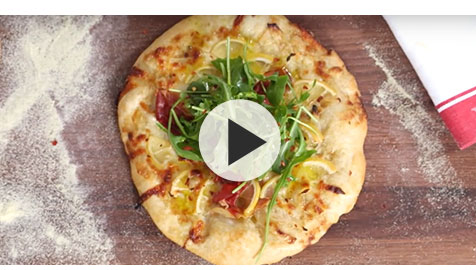 Pizza with Prosciutto, Arugula and Lemon