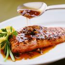 Pepper-Crusted Salmon with Olive Sauce