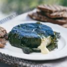 Grape Leaf-Wrapped Camembert with Pesto