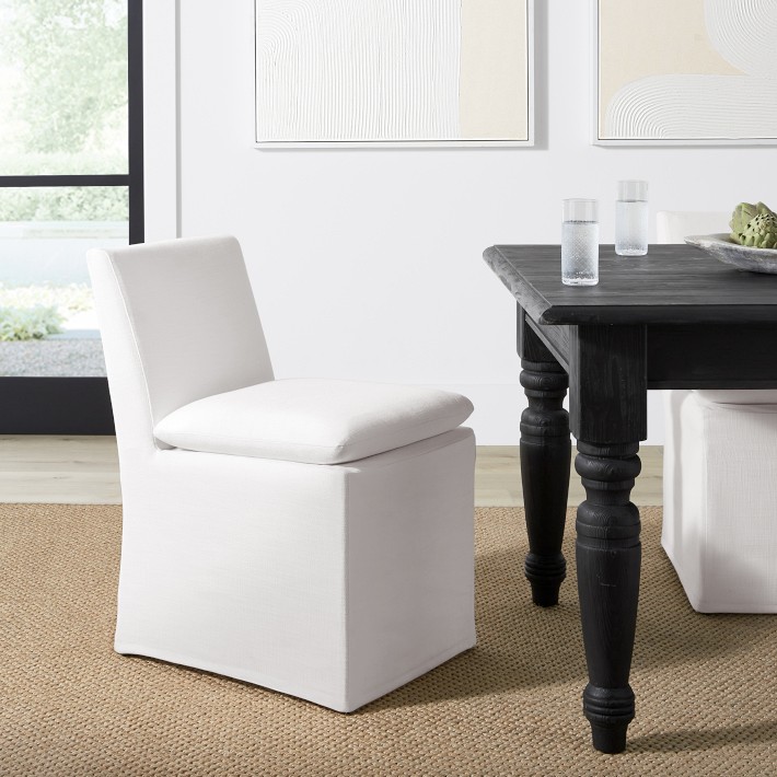 white linen slipcovered dining chair