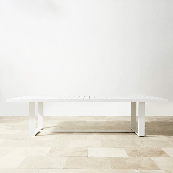 white rectangular outdoor dining table