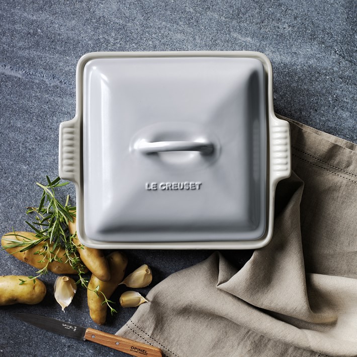 https://assets.wsimgs.com/wsimgs/rk/images/dp/wcm/202314/0150/le-creuset-heritage-stoneware-shallow-square-covered-baker-o.jpg