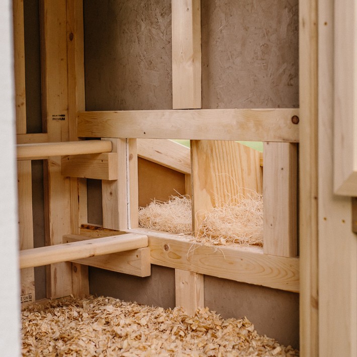 Charming White Chicken Coop with Silver Metal Roof, Chicken Run, and Cedar Cupola Williams Sonoma