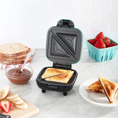 https://assets.wsimgs.com/wsimgs/rk/images/dp/wcm/202328/0070/dash-pocket-sandwich-maker-m.jpg