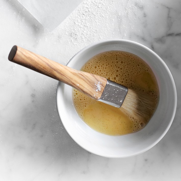 https://assets.wsimgs.com/wsimgs/rk/images/dp/wcm/202330/0384/williams-sonoma-olivewood-pastry-brush-o.jpg