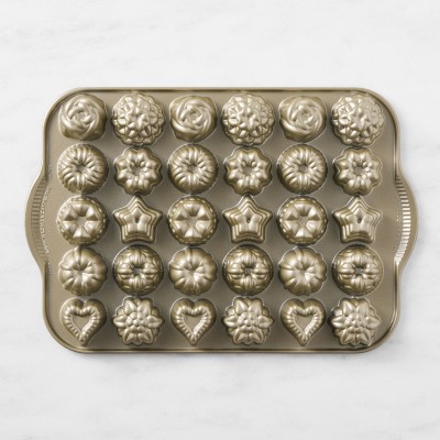 https://assets.wsimgs.com/wsimgs/rk/images/dp/wcm/202331/0003/nordic-ware-nonstick-cast-aluminum-teacake-plaque-m.jpg