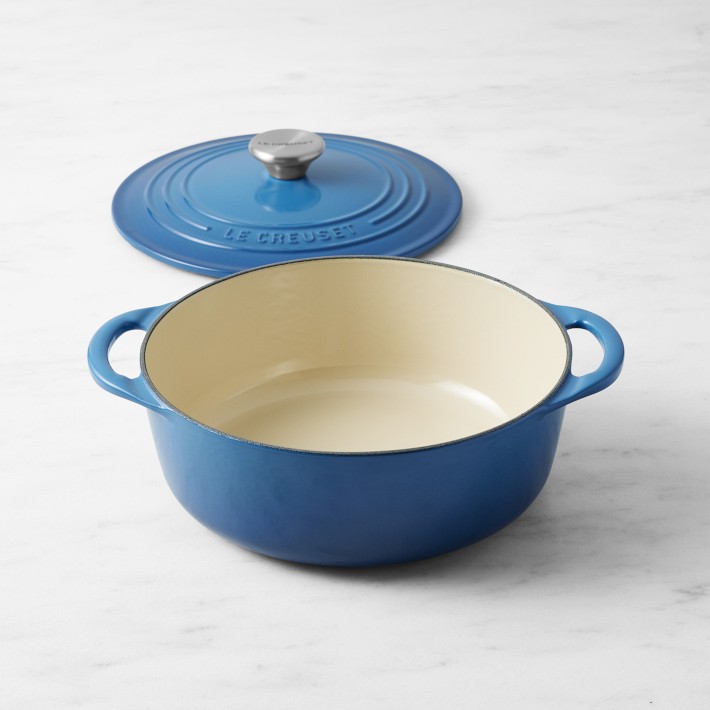 https://assets.wsimgs.com/wsimgs/rk/images/dp/wcm/202331/0004/le-creuset-enameled-cast-iron-shallow-round-oven-2-3-4-qt-o.jpg