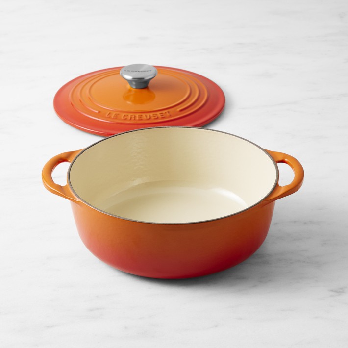 https://assets.wsimgs.com/wsimgs/rk/images/dp/wcm/202331/0005/le-creuset-enameled-cast-iron-shallow-round-oven-2-3-4-qt-1-o.jpg