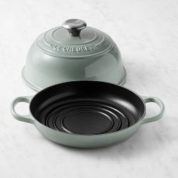 https://assets.wsimgs.com/wsimgs/rk/images/dp/wcm/202333/0062/le-creuset-enameled-cast-iron-bread-oven-1-j.jpg