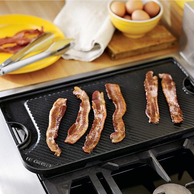 https://assets.wsimgs.com/wsimgs/rk/images/dp/wcm/202334/0143/le-creuset-enameled-cast-iron-reversible-griddle-grill-m.jpg